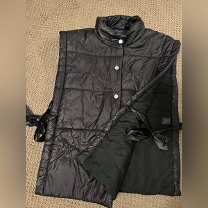 Black vest- one size- ribbons on side make it adjustable